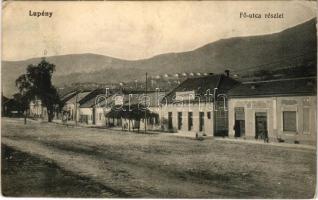 1915 Lupény, Lupeni; Fő utca, Guttmann Manó üzlete. Róth Vilmos kiadása / main street, shops + "PETROZSÉNY - PISKI 128 A" vasúti mozgóposta bélyegző (EK)