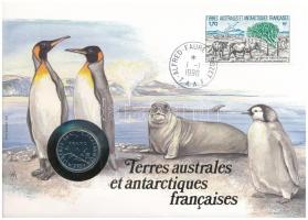 Francia Déli és Antarktiszi területek felbélyegzett borítékban, bélyegzéssel, német nyelvű tájékoztatóval, benne Franciaország 1989. 1Fr Ni T:UNC French Southern and Antarctic Lands in envelope with stamp, cancellation, with German description, in it France 1989. 1 Franc Ni C:UNC