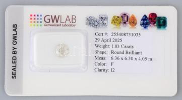 1,03 Ct brilliáns. Kerek brilliáns csiszolású gyémánt F, I2, 6,36x6,3x4,05 mm tanúsítvánnyal
