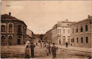 Léva, Levice; Báti utca, Takarékpénztár. Vasúti levelezőlapárusítás 616. / street view, savings bank + "1938 Léva visszatért" So. Stpl. (fl)