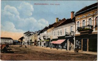 Kézdivásárhely, Targu Secuiesc; Fő tér, Jancsó F. Lajos, Wertán István, Ifj. Dávid István üzlete, piac. Turóczi István kiadása / main square, shops, market (EK)