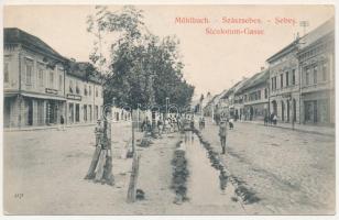 1910 Szászsebes, Mühlbach, Sebesul Sasesc, Sebes; Siculorum-Gasse / Sikolorum utca, Josef Wagner, Julius Kohuth üzlete. J. Hientz kiadása / street view, shops (EK)