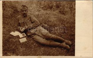 1916 Holczmann Róbert magyar katona levelet ír / WWI Austro-Hungarian K.u.k. military, Hungarian soldier writing letters. photo + "K.u.k. Etappenpostamt 61" + "M. kir. pécsi 8. honvéd huszár ezred parancsnokság" (EK)