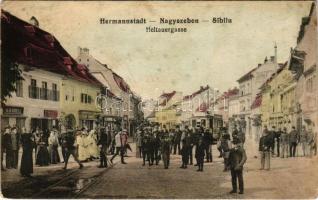 1915 Nagyszeben, Hermannstadt, Sibiu; Heltauergasse / Nagydisznódi utca, A.R. Grell, Jikeli üzlete, villamos. J. Bein kiadása / street, shops, tram (kopott sarkak / worn corners)
