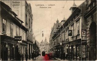 Ljubljana, Laibach; Presernova ulica / street view, tram, restaurant of Ivanka Matjan, publisher's shop (Emil Dobric), telephone booth, American shoe store (fl)