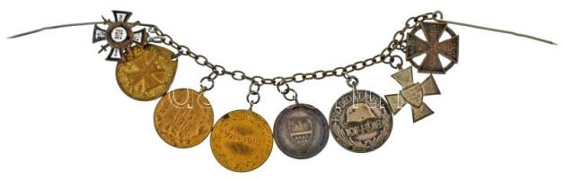 ~1918. 8db-os kitüntetés miniatűr tétel frakkláncon, közte "Porosz Frontharcos Háborús Kereszt kardokkal" zománcozott, "Német Háborús Emlékérem", "Európai Háborús Emlékérem 1915-1918", "Osztrák Háborús Emlékérem", "Erdélyi Emlékérem", "Magyar Háborús Emlékérem", "Nemzetvédelmi Kereszt", "Károly Csapatkereszt" miniatűrök T:XF,VF ~1918. 8pcs of decoration's miniatures on white tie accesories chain, with "Prussian War Honor Cross with swords" enamelled, "GermanWar Merit Medal", "European War Commemorative Medal 1915-1918", "Austrian Great War Commemorative Medal", Commemorative Medal for the Liberation of Transylvania", "Hungarian Commemorative War Medal with swords and a helmet", "National Defense Cross", "Charles Troop Cross" miniatures C:XF,VF