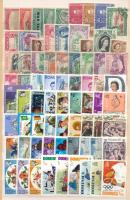 Dominika és St Kitts 135 db klf bélyeg, kétoldalas közepes berakólapon