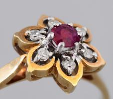 Arany (Au) gyűrű, m: 57, 6 darab gyémánt berakással, cca 0,2ct, rubin berakással, jelzett, bruttó 2,3g