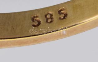 Arany (Au) gyűrű, m: 57, 6 darab gyémánt berakással, cca 0,2ct, rubin berakással, jelzett, bruttó 2,...