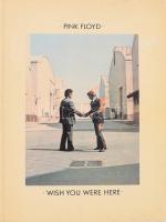Pink Floyd: Wish you were here. This book designed by Hipgnosis. Photographs by Jill Furmanovsky, Storm Thorgerson, Peter Christopherson and Po. London, 1975., Pink Floyd Music Publishers Ltd, 88 p. Gazdag képanyaggal illusztrált. Kottával. Angol nyelven. Kiadói papírkötés, javított kötéssel és gerinccel.