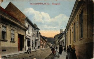 1916 Oravicabánya, Oravica, Oravicza, Oravita; Fő utca, üzletek. Kaden József kiadása / Hauptgasse / main street, shops (kopott sarkak / worn corners)