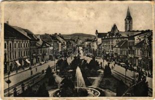 1938 Kassa, Kosice; Stefánikova ul. / Stefánik utca, szökőkút, gyógyszertár, Schnitzer üzlete / street, fountain, pharmacy, shops + "1938 KASSA VISSZATÉRT" So. Stpl (EB)