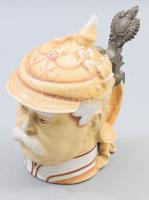 Otto von Bismarck kancellárt mintázó német porcelán sörös korsó, fém szerelékkel, alján "Musterschutz" jelzéssel, cca. XX. sz. eleje, korát tekintve jó állapotban, m: 17,5 cm // Otto von Bismarck German porcelain beer mug, marked "Musterschutz" on the bottom, ca. early 20th century, in good condition