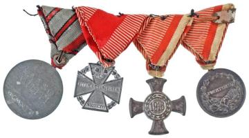 1916. "Vas Érdemkereszt a Vitézségi Érem szalagján" Fe kitüntetés eredeti mellszalagon + 1917. "Károly Ezüst Vitézségi Érem II. osztálya" jelzetlen Ag kitüntetés eredeti mellszalagon. Szign.: Kautsch + 1916. "Károly-csapatkereszt" Zn kitüntetés eredeti mellszalagon + 1918. "Sebesültek Érme" Zn kitüntetés két sebesülés után járó mellszalaggal. Szign.: R. Placht T:XF,VF patina, a mellszalagok egymáshoz varrva Hungary 1916. "Iron Merit Cross on a war ribbon" Fe decoration with worn original ribbon + "Charles Troop Cross" Zn decoration with original ribbon + 1917. "Silver Gallantry Medal, 2nd Class" Ag decoration, without hallmark, on original ribbon. Sign.: Kautsch + 1918. "Wound Medal" Zn decoration with ribbon after two wounds. Sign.: R. Placht C:XF,VF patina, the ribbons are sewn together NMK. 229., 295., 306., 328.