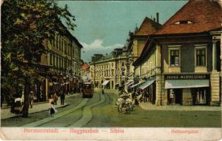 1910 Nagyszeben, Hermannstadt, Sibiu; Heltauergasse / Disznódi utca, Julius Wermescher üzlete, villamos, Transsylvania szálloda. G. A. Seraphin kiadása. Chromophot v. Jos. Drotleff / street view, shops, tram, hotel (EM)