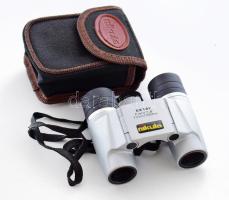 Összehajtható kis zsebtávcső, tokjában.