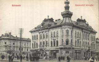 Kolozsvár by the Szamos bridge with the flour shop of Vilmos Wertheimer and the butcher shop of the Grünwald brothers (EB)
