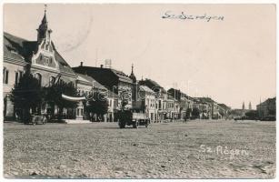 1940 Szászrégen, Sächsisch-Regen, Reghin; bevonulás, náci horogkeresztes zászló, automobil, teherautó, magyar zászló / entry of the Hungarian troops, Nazi swastika flag, automobiles, truck, Hungarian flag. photo + "1940 SZÁSZRÉGEN VISSZATÉRT" So. Stpl (EK)