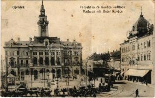 1915 Újvidék, Novi Sad; Városháza, Kovács József szálloda, villamos, üzletek, lovaskocsik. Vranits és Tausch kiadása / town hall, hotel, tram, shops, horse carriages (fl)
