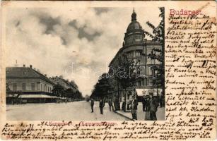 Budapest VIII. Kerepesi út (mai Rákóczi út 1.), Nemzeti színház és bérháza, Holzer és Schwartz Simon üzlete, Életbiztosító részvénytársaság, Ehm János étterem és sörcsarnok, villamos (EB)