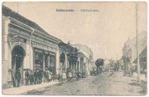 Csíkszereda, Miercurea Ciuc; Rákóczi utca, Szvoboda Miklós könyvnyomda, papír- és könyvkereskedése / street view with book, printing and paper shop (gyűrődések / creases)