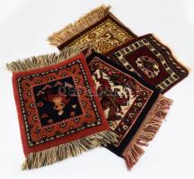 4 darab kisméretű keleti stílusú szőnyeg, közte kézzel készült.