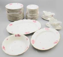 1919-1935 Rosenthal lilavirág mintás 104 részes étkészlet. 12 darab nagytányér d: 26 cm - 6 darab mélytányér d: 25,5 cm - köretes tál d: 25 cm - 12 darab kistányér d: 19,5 cm - 12 darab süteményes tányér d: 17 cm - 12 darab szendvicses tányér d: 15 cm - 12 darab teás csészealj 11 darab csészével - 12 darab kávés csészealj 10 darab csészével - 2 darab szószkínáló h: 21 cm - 2 darab pecsenyés kínáló 43x32 cm, 37x27 cm. Jelzett, 1-1 kopással, kopottsággal. /// KIZÁRÓLAG SZEMÉLYES ÁTVÉTEL, NEM POSTÁZZUK! / ONLY PERSONAL COLLECTION AT OUR OFFICE!