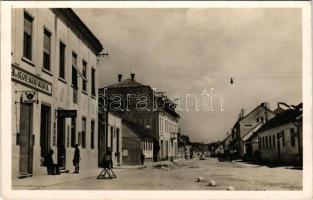 Muraszombat, Murska Sobota; Lendva utca, gyógyszertár, Heimer üzlete. Zvér János kiadása / street view, pharmacy, shops (fl)