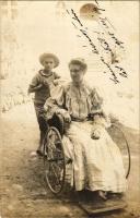 1905 Besztercebánya, Banská Bystrica; hölgy tolókocsiban, gyerekkel / lady in wheelchair with a boy. photo