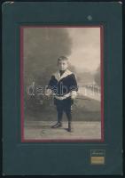 cca 1910 Kisfiú műtermi portréja, kartonra kasírozott fotó Joánovics kolozsvári műterméből, kisebb sérüléssel, 14,5×9,5 cm