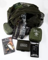 Mil-Tec túlélő / túrázáshoz való szerszámok, kellékek: kézi fűrész, balta, elsősegélycsomag, kovakő, fenőkő, iránytűs síp, stb. Mind újszerű állapotban, több bontatlan csomagolásban, hálós zsákban.