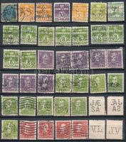 Dánia 74 db céglyukasztásos bélyeg, köztük párok, fordított lyukasztások is, közepes berakólap mindkét oldalán