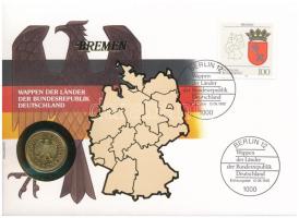 Németország 1991D 1M aranyozott Cu-Ni, tartományi címereket ábrázoló bélyeggel felbélyegzett "BREMEN" borítékban, bélyegzéssel, német nyelvű leírással T:UNC Germany 1991D 1 Mark gilt Cu-Ni in "BREMEN" envelope with stamps depicting provincial coats of arms and cancellation, with German description C:UNC