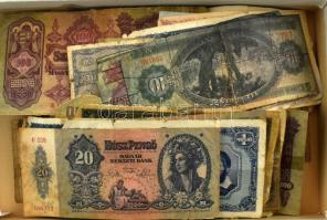 Egy doboznyi vegyes, nagyrészt kifejezetten rossz tartású (szakadt, foltos, hiányos) magyar és külföldi bankjegyből álló tétel T:G,Pr Box of Hungarian and foreign banknotes, mainly in bad condition (tear, spots, missing material) C:G,Pr