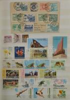 Észak-Korea modern tétel sok motívum bélyeggel, sorokkal, blokkokkal, benne egy Dél-Korea képeslap Stockholmba, 2 db 8 lapos, A/4-es berakóban