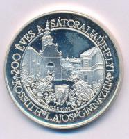 Sebestyén Sándor (1949-2010) 1989. "MÉE - 200 éves a sátoraljaújhelyi Kossuth Lajos Gimnázium / '... Én is a növendékük voltam...' 1810-1816" kétoldalas, peremen jelzett Ag emlékérem kapszulában (35,42g/0.835/42,5mm) T:AU (eredetileg PP), kis patina Adamo SU2