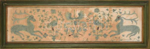 1751 Református úrasztali terítő címer- és állatábrázolással. 1751, Felső-Magyarország, üvegezett fakeretben, üveg sérült, 21x73 cm /// Reformed communion table cloth with coat of arms and animal motifs. 1751, Upper Hungary, in a glazed wooden frame, glass damaged, 21 × 73 cm.