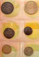 Kisalakú fekete műbőr érmeberakó, összesen 60db klf méretű férőhellyel, benne 19db külföldi érmével, közte Románia 1924. 2L Cu-Ni "Bun Pentru" + Dánia 1968. 5K Cu-Ni "IX. Frigyes" + Kanada 1969. 1$ Ni, stb. T:vegyes, lapok enyhén elszíneződtek Small, black faux leather coin holder, with 60 places at all. In it 19pcs foreign coins, including Romania 1924. 2 Lei Cu-Ni "Bun Pentru" + Danmark 1968. 5 Kroner Cu-Ni "Frederik IX" + Canada 1969. 1 Dollar Ni, etc, C:mixed, some sheets are discolored