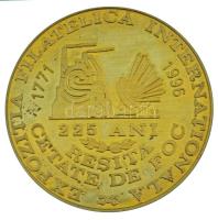 Románia 1996. "Nemzetközi Filatéliai Kiállítás - Resita Cetate de Fog / Krassó-Szörény Filatéliai Egyesület 1771-1996" kétoldalas, aranyozott fém emlékérem műanyag tokban (59mm) T:AU,XF Romania 1996. "Expozitia Filatelica Internationala - Resita Cetate de Fog / Asociatia Filatelica Caras-Severin 1771-1996" two-sided, gilt metal commemorative medallion in plastic case (59mm) C:AU,XF