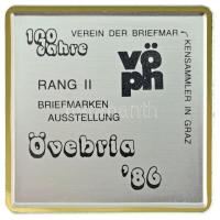Ausztria 1986. Osztrák Bélyeggyűjtő Egyesületek Szövetsége "100 év - Bélyeggyűjtők Egyesülete Grazban - Bélyegkiállítás - Övebria '86" egyoldalas, szélén aranyozott fém emlékplakett (59x59mm) T:AU Austria 1986. "Vöph (Verband Österreichischer Philatelistenvereine) - 100 Jahre - Verein der Briefmar, Kensammler in Graz - Rang II - Briefmarken Ausstellung - Övebria '86" one-sided, metal commemorative plaque, gilt at the edge (59x59mm) C:AU