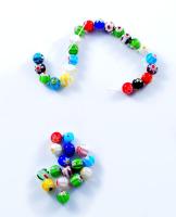 Kis zacskónyi murano millefiori üveggyöngy