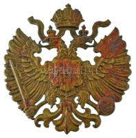 Ausztria 1900-1918 k. Habsburg címert ábrázoló, festett bronz jelvény (övcsat?) tű nélkül (49x49mm) T:XF a festés lekopott Austria around 1900-1918 Painted bronze badge (belt buckle?) depicting the Habsburg coat of arms without pin (49x49mm) C:XF the paint is worn off