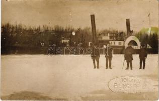 S. M. D. Achilles oldalkerekes gőzüzemű vontatóhajó télen a befagyott Dunán, Johann Eilingsfeld kapitány felvétele / "ACHILLES" paddle steamer tug in winter in the frozen Danube with the captain. Achilles was requisitioned in 1916 by the Zentraltransportleitung (ZTL) for service in the Danube. In 1918, she was returned to DDSG. In 1942, she was transferred to the Hrvatsko riječno brodarstvo of Zagreb, Croatia, and renamed Sava. In June 1944, the former Achilles was sunk by a mine near Surduk, in the Serbian Voivodina, at the Danube River kilometer marker 1,208.00. Johann Eilingsfeld Captain photo (b)