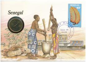 Közép-afrikai Államok 1989. 25Fr Al-bronz "Szenegál" felbélyegzett borítékban, bélyegzéssel, német nyelvű leírással T:UNC Central African States 1989. 25 Francs Al-bronze in "Senegal" envelope with stamp and cancellation, with German description C:UNC