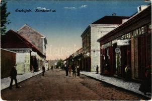 Érsekújvár, Nové Zámky; Komáromi út, Stern Jakab üzlete. Vasúti levelezőlapárusítás 445. / street view, shops (kopott sarkak / worn corners)
