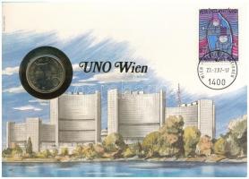 Ausztria / ENSZ Bécs 1987. 10Sch, felbélyegzett borítékban, bélyegzéssel, német nyelvű leírással T:UNC Austria / UNO Vienna 1987. 10 Schilling in envelope with stamp and cancellation, with German description C:UNC