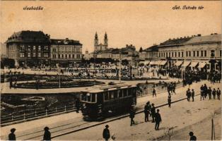 Szabadka, Subotica; Szent István tér, villamos, Földes Samu, Demeter és Fiai üzlete. Vasúti levelezőlapárusítás 29. sz. - 1918. / square, tram, shops