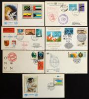 ENSZ FDC gyűjtemény / tétel a kezdetektől a 80-as évekig benne New York, Genf, Bécs közte rengeteg boríték a Zászlók sorok klf. bélyegeivel, fa dobozban.