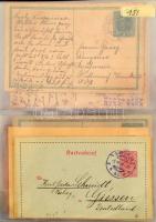 180 férőhelyes levél / képeslap berakó fekete gyűrűs borítóval, benne néhány régi külföldi küldemény