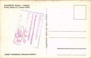 1942 Kolozsvár, Cluj; Horthy Miklós út a Szamos híddal, gyógyszertár, újságosbódé, Fészek bár és Varga kávéház reklámja plakátokon. Cenzortiszt által felülvizsgált lap / street, bridge, pharmacy, newspaper stand, bar and café advertisements. Postcard reviewed by a censor officer (fl)